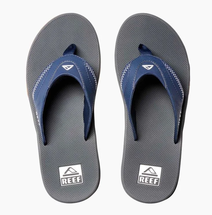 Women's Flat Slide Sandals with a Memory Foam Insole in White for All - Day ComfortWomen's Flat Slide Sandals with a Memory Foam Insole in White for All - Day ComfortReef Sandals Men's Features A Bottle Opener