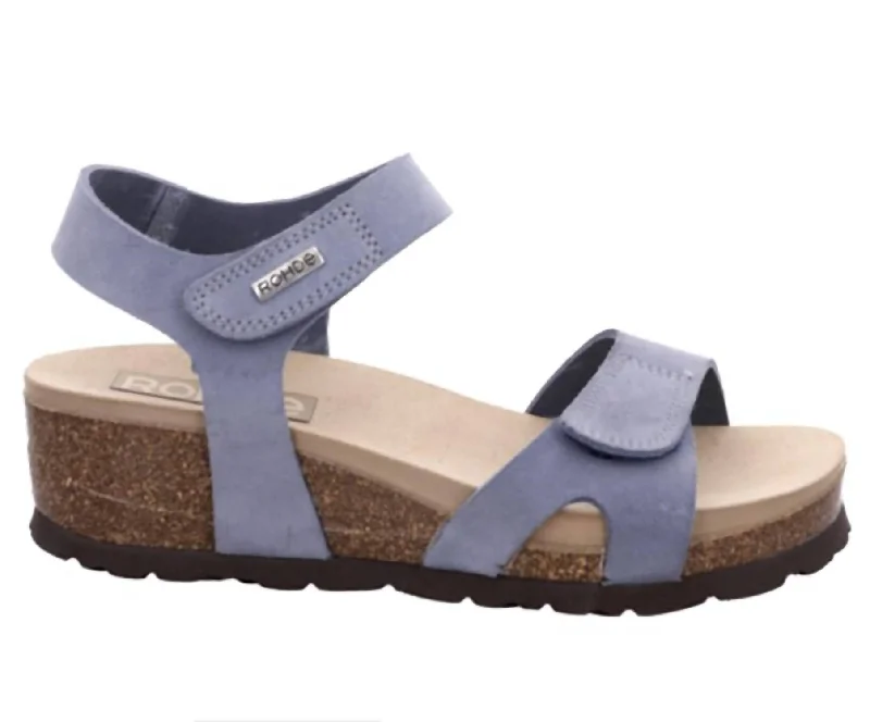 Women's Sandals with a Wedge Heel and a Tassel Detail in Orange for a Trendy LookWomen's Wedge Sandals In Jeans