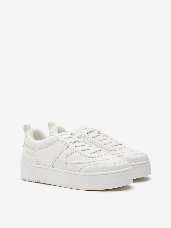 Chunky - Sole Women's Platform Sneakers in White for a Trendy Street Style LookLUNA BLU White Textured Chunky Lace-Up Sneakers Chunky - Sole Women's Platform Sneakers in White for a Trendy Street Style LookLUNA BLU White Textured Chunky Lace-Up Sneakers