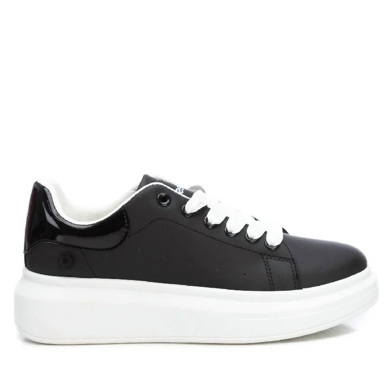 Vegan - Friendly Women's Sneakers Made from Recycled Materials for an Eco - Conscious ChoiceWomen's Trainer Sneakers In Black